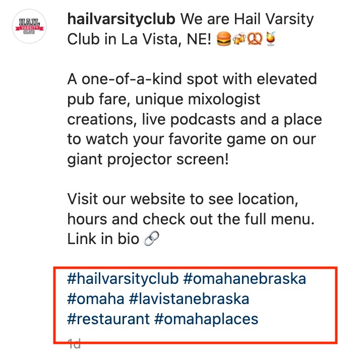 Screenshot of Hail Varsity Club post on Instagram with local hashtags in red box